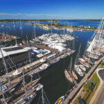 AMERICAN INFRASTRUCTURE FUNDS is exploring the sale of Safe Harbor Marinas LLC, which owns and operates eight marinas in Rhode Island including the Newport Shipyard, pictured above. / COURTESY SAFE HARBOR MARINAS LLC
