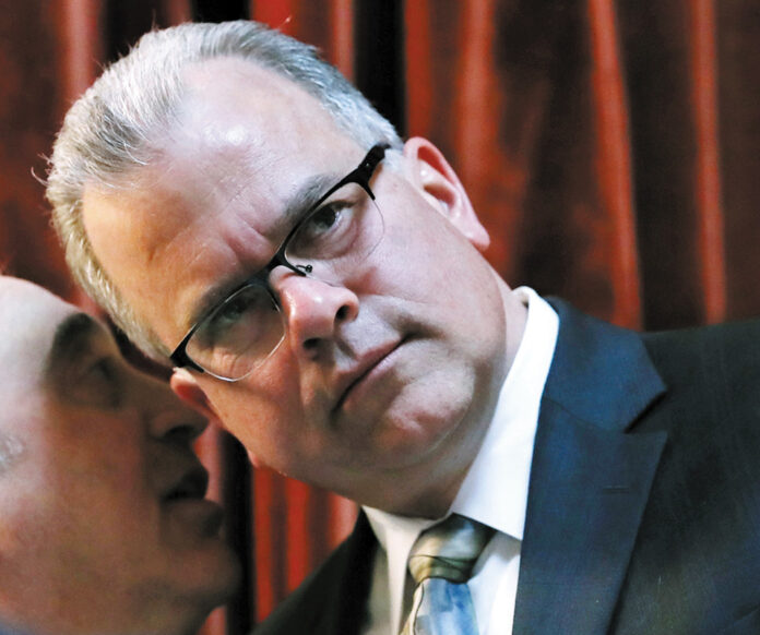HOUSE SPEAKER NICHOLAS A. MATTIELLO, pictured during a legislative session in 2019, and Senate President Dominick J. Ruggerio answered questions at the Greater Providence Chamber of Commerce's annual legislative luncheon on Wednesday. / AP FILE PHOTO/CHARLES KRUPA