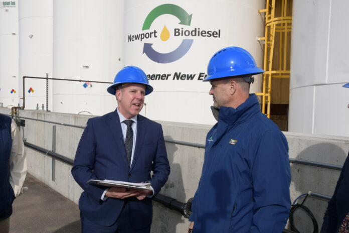 DENNIS DEZIEL, left, U.S. Environmental Protection Agency administrator, praises Newport Biodiesel Inc. for its environmental best-practices during a visit to the company Wednesday to announce the results of the EPA's latest Toxic Release Inventory. At right is Newport Biodiesel President Blake Blanky. / PBN PHOTO/MIKE SKORSKI