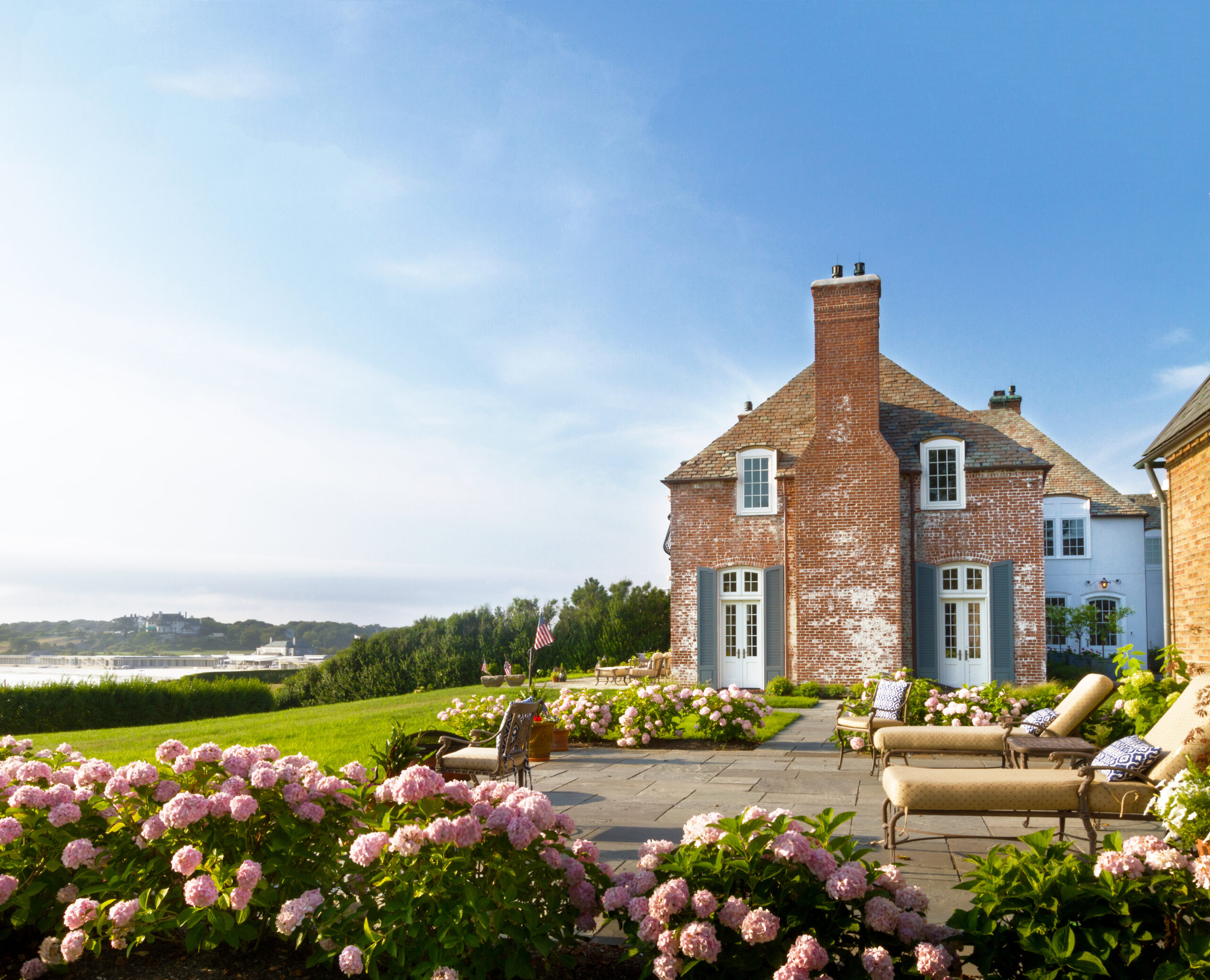 THE ESTATE features views of the Atlantic Ocean and Bailey Beach. / COURTESY LILA DELMAN REAL ESTATE