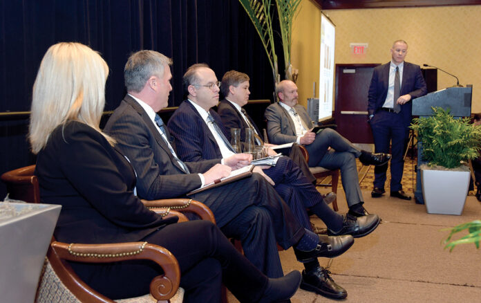 ECONOMIC CONCERNS: Panelists, from left, Kristen Urbach, Thomas O. Sweeney, Stefan Pryor, Mark K. W. Gim and Luke Ebersold discuss a variety of concerns at the PBN Economic Trends Summit while moderator Thomas Zitzouris looks on. / PBN PHOTO/MIKE SKORSKI ECONOMIC CONCERNS: Panelists, from left, Kristen Urbach, Thomas O. Sweeney, Stefan Pryor, Mark K. W. Gim and Luke Ebersold discuss a variety of concerns at the PBN Economic Trends Summit while moderator Thomas Zitzouris looks on. / PBN PHOTO/MIKE SKORSKI