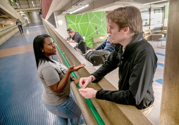 TUITION-FREE: Community College of Rhode Island student Davila Jackley, left, meets with classmate William Rider. Jackley is taking advantage of the Rhode Island Promise program.
PBN PHOTO/MICHAEL SALERNO TUITION-FREE: Community College of Rhode Island student Davila Jackley, left, meets with classmate William Rider. Jackley is taking advantage of the Rhode Island Promise program.
PBN PHOTO/MICHAEL SALERNO