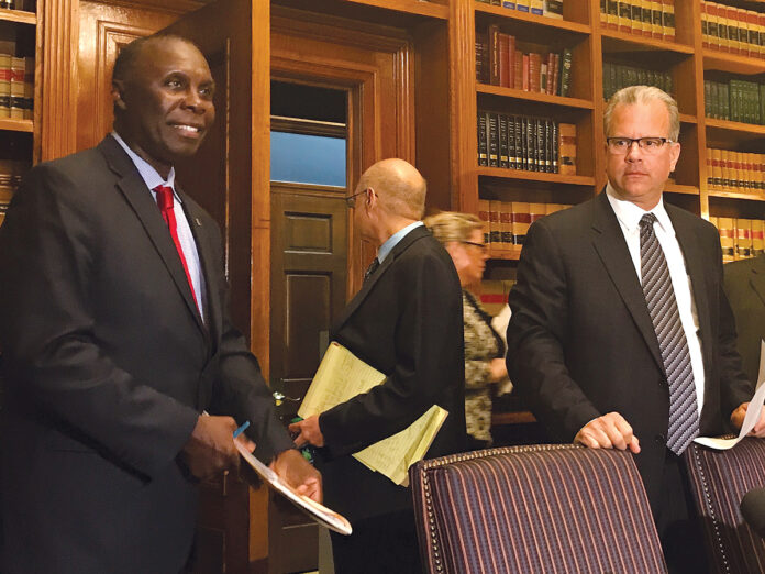 REP. MARVIN L. ABNEY, at left, has proposed a bill, recently passed by the House, that wold broaden the state’s motion picture tax credit program, in an effort to attract larger films and documentary productions. At right is Speaker Nicholas A. Mattiello. / PBN FILE PHOTO ELI SHERMAN.