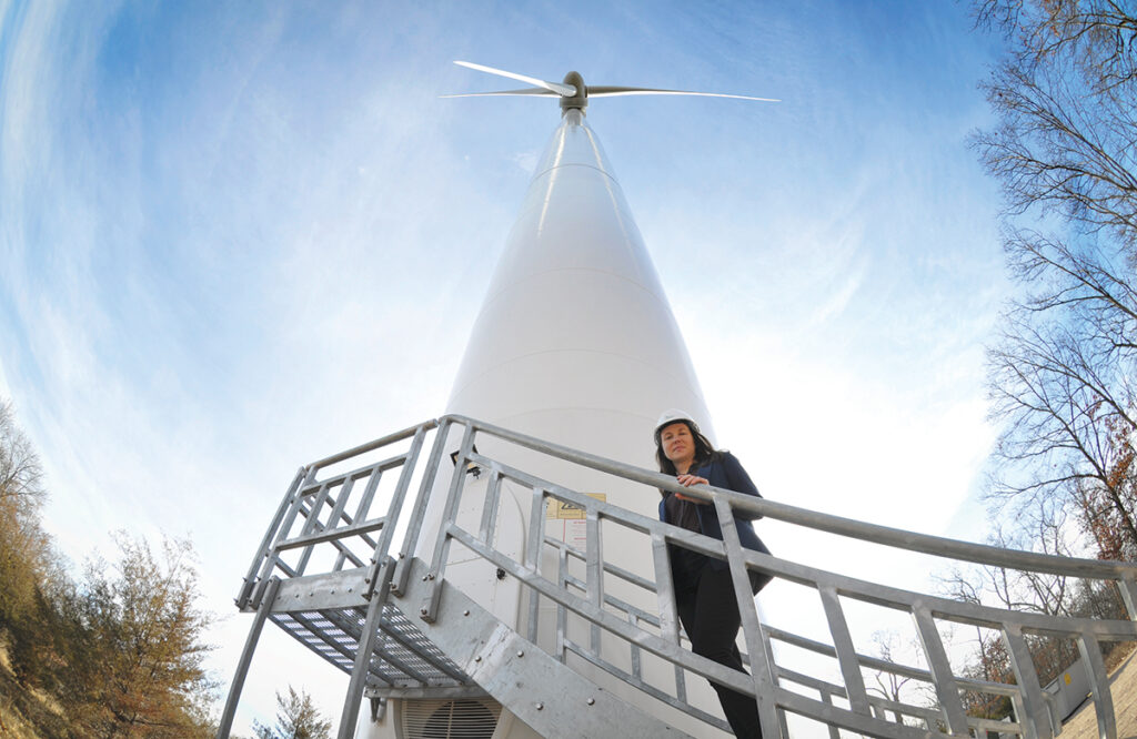 MORE POWER: Hannah Morini is the director of business development at Green Development, which built the wind turbine at 42 Thornton Way in North Kingstown. Morini says wind power makes more sense than solar from a land-use perspective. / PBN PHOTO/MIKE SKORSKI