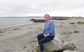 STRONG CONNECTIONS: Jennifer McCann, director of the U.S. Coastal Program at the University of Rhode Island&rsquo;s Coastal Resources Center, shown here at the URI Bay Campus in Narragansett, says Rhode Island can build a sustainable future by connecting its related industries in the blue economy. / PBN PHOTO/MIKE SKORSKI