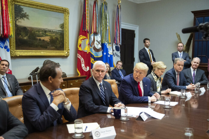 PRESIDENT DONALD TRUMP with, from left, United Airlines CEO Oscar Munos, Vice President Mike Pence, Trump, White House coronavirus response coordinator Dr. Deborah Birx, American Airlines CEO Doug Parker, Southwest CEO Gary Kelly, speaks during a coronavirus briefing with Airline CEOs in at the Roosevelt Room of the White House, Wednesday, March 4, 2020, in Washington. / AP FILE PHOTO/MANUEL CANETA