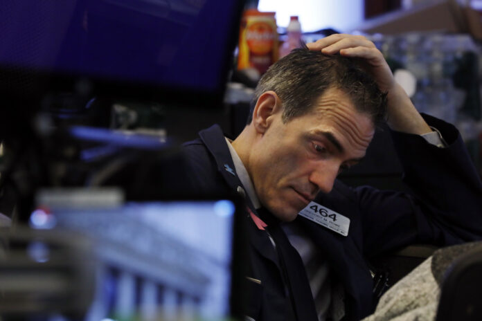 THE DOW Jones Industrial Average lost 1,582 points, or 6.1%, to start the day Monday. / AP FILE PHOTO/ RICHARD DREW THE DOW Jones Industrial Average lost 1,582 points, or 6.1%, to start the day Monday. / AP FILE PHOTO/ RICHARD DREW