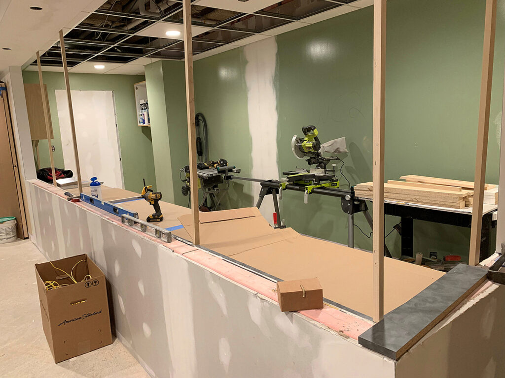BEFORE: The old reception desk area in the waiting room under renovation. / COURTESY RHODE ISLAND MEDICAL IMAGING INC.