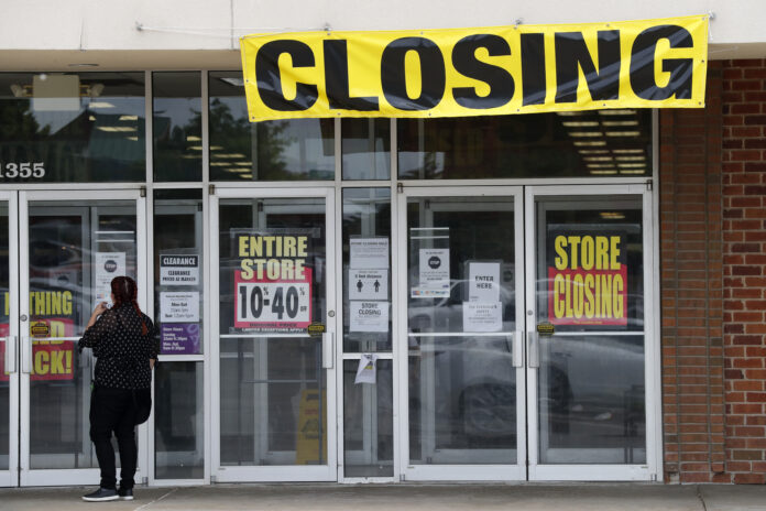 U.S. CONSUMER SPENDING declined a record 13.6% in April. / AP FILE PHOTO/JEFF ROBERSON U.S. CONSUMER SPENDING declined a record 13.6% in April. / AP FILE PHOTO/JEFF ROBERSON