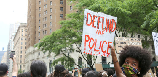 PROTESTERS march in New York City on June 6. Calls to  “defund the police” have spread nationwide in the wake of the death of George Floyd while in police custody last month in Minneapolis. / AP FILE PHOTO/RAGAN CLARK
