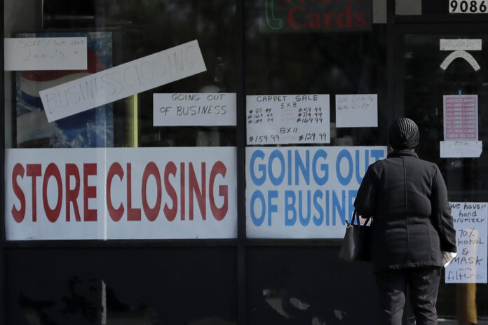 ADP has found that U.S. businesses have let go of a combined 22.6 million jobs since March. / AP FILE PHOTO/NAM Y. HUH
