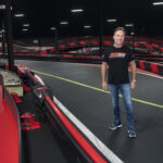 MIKE HEZEMANS, owner, R1 Indoor Karting in Lincoln, stands in the middle of his go-kart track. Hezemans confirmed Monday that his facility reopened for business Friday to limited capacity, arguing that his facility should reopen if Twin River Worldwide Holdings Inc. reopened its casinos, PBN PHOTO/MICHAEL SALERNO