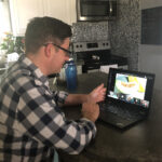 PLAY TIME: Jeremy Girard, director of marketing at Envision Technology Advisors, participates in a trivia game from his home during the company’s “Friday Funday.” / COURTESY JEREMY GIRARD