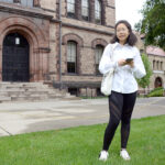 International students face tough choices DISTANCE LEARNING: As a precaution against COVID-19, international student Grace Deng, who will be a senior this year at Brown University, plans to take her courses online while living in Providence when classes resume in the fall. / PBN PHOTO/ELIZABETH GRAHAM