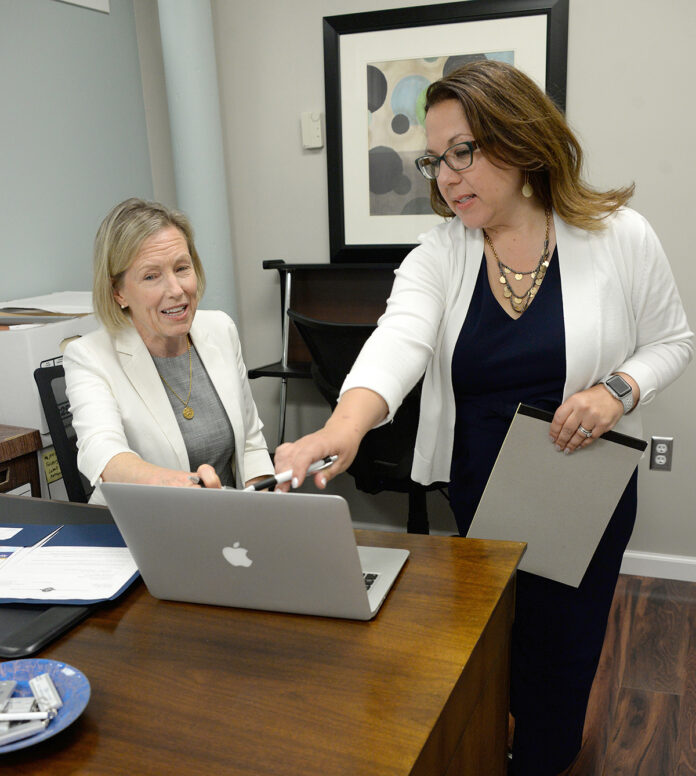 ADAPTING: Key Mediation LLC owners Kristen Sloan Maccini, left, and Christine L. Marinello have had to