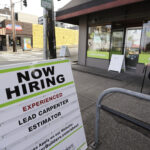 U.S. PAY and benefits increased 0.5% in the second quarter, the slowest pace in three years in the April-June quarter. / AP FILE PHOTO/ ELAINE THOMPSON.