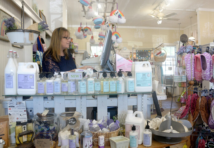SALES BOOST: Lori Lyons, owner of Beauty and the Bath in North Kingstown, says after boosting the online presence of her gift store as a result of participating in the R.I. Commerce Corp.’s Small Business Technical Support program, she’s expanded the reach of her business and increased her sales by 25%. / PBN PHOTO/ELIZABETH GRAHAM SALES BOOST: Lori Lyons, owner of Beauty and the Bath in North Kingstown, says after boosting the online presence of her gift store as a result of participating in the R.I. Commerce Corp.’s Small Business Technical Support program, she’s expanded the reach of her business and increased her sales by 25%. / PBN PHOTO/ELIZABETH GRAHAM