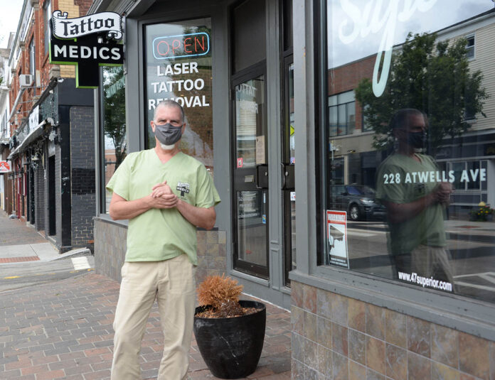 IN DEMAND: Dr. Richard Rosol, owner of TattooMedics Inc. in Providence, says his tattoo removal business has never been busier since reopening after elective surgeries were allowed to resume in Rhode Island amid the COVID-19 pandemic. / PBN PHOTO/ELIZABETH GRAHAM IN DEMAND: Dr. Richard Rosol, owner of TattooMedics Inc. in Providence, says his tattoo removal business has never been busier since reopening after elective surgeries were allowed to resume in Rhode Island amid the COVID-19 pandemic. / PBN PHOTO/ELIZABETH GRAHAM