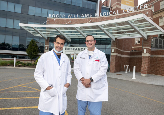 FIRST TIME: Dr. Nabil Toubia, left, gastroenterologist, and Dr. Abdul Saied Calvino, surgical oncologist, recently performed an innovative surgical procedure, to help correct blockage of the digestive system that can occur in patients with advanced duodenal cancer. / PBN PHOTO/MICHAEL SALERNO FIRST TIME: Dr. Nabil Toubia, left, gastroenterologist, and Dr. Abdul Saied Calvino, surgical oncologist, recently performed an innovative surgical procedure, to help correct blockage of the digestive system that can occur in patients with advanced duodenal cancer. / PBN PHOTO/MICHAEL SALERNO