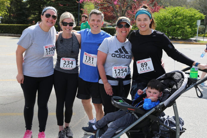 FUN RUN: South County Health staffers, from left, Claire Mathews, Jill Niedman, Dr. Rob Gianfranco, Christine Stout, Paige Damle, and Mathews’ son, Jaxson, participated in the health care providers’ inaugural Centennial 5K last year to help raise money for its cardiac rehab center. / COURTESY SOUTH COUNTY HEALTH