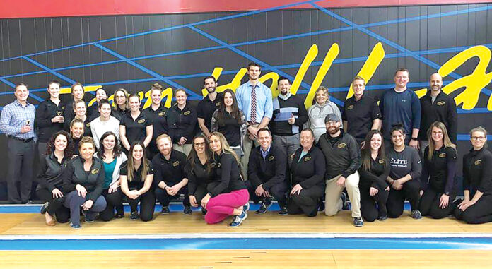 FAST LANE: Elite Physical Therapy employees gather for a few games of bowling at Town Hall Lanes in Johnston. 
COURTESY ELITE PHYSICAL THERAPY FAST LANE: Elite Physical Therapy employees gather for a few games of bowling at Town Hall Lanes in Johnston. 
COURTESY ELITE PHYSICAL THERAPY