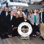 CRUISING ALONG: Custom Computer Specialists Inc. employees gather for a cruise in Boston in 2018. COURTESY CUSTOM COMPUTER SPECIALISTS INC.