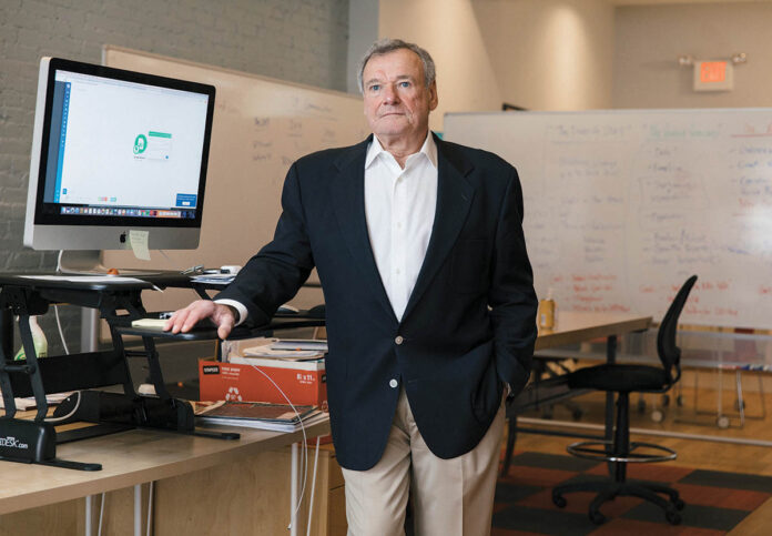 fancy footwork: Phoenix NeuroStim Therapeutics President Steven Metzger in his company’s Providence office, which is bringing to market vibrating soles to help people with diabetes. / PBN PHOTO/RUPERT WHITELEY