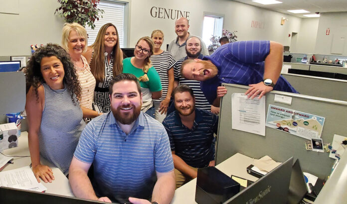 EARNING THEIR STRIPES: Vertikal6 employees participate in the company’s Striped Shirt Day at the office. / COURTESY VERTIKAL6 EARNING THEIR STRIPES: Vertikal6 employees participate in the company’s Striped Shirt Day at the office. / COURTESY VERTIKAL6
