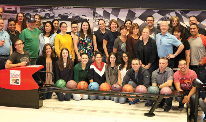 READY TO ROLL: The staff from Brokers’ Service Marketing Group LLC enjoys its 2019 company outing near the bowling lanes at R1 Indoor Karting in Lincoln.
COURTESY BROKERS’ SERVICE MARKETING GROUP LLC READY TO ROLL: The staff from Brokers’ Service Marketing Group LLC enjoys its 2019 company outing near the bowling lanes at R1 Indoor Karting in Lincoln.
COURTESY BROKERS’ SERVICE MARKETING GROUP LLC