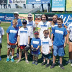 FIELD DAY: Automated Business Solutions Inc. employees and their families enjoy the company’s Family Day and Kids Softball Game at McCoy Stadium in Pawtucket.  COURTESY AUTOMATED BUSINESS SOLUTIONS INC.