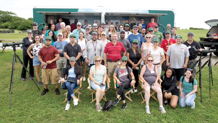 PROPER TRAINING: Employees for Cranston-based Swarovski Optik North America Ltd. pose for a group picture while out during a training day in 2019. / COURTESY SWAROVSKI OPTIK NORTH AMERICA LTD. PROPER TRAINING: Employees for Cranston-based Swarovski Optik North America Ltd. pose for a group picture while out during a training day in 2019. / COURTESY SWAROVSKI OPTIK NORTH AMERICA LTD.
