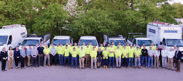 HAPPY FRIDAY: Employees at Pariseault Builders Inc. are offered Summer Fridays, where each employee receives two free Fridays off during the summer months. / COURTESY PARISEAULT BUILDERS INC.