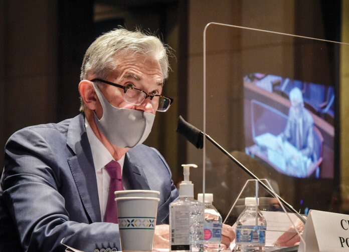FED CHAIR Jerome Powell said that the economy's recovery from the COVID-19 pandemic may falter without further aid in a speech to the National Association for Business Economics. / AP FILE PHOTO/BILL O'LEARY/THE WASHINGTON POST FED CHAIR Jerome Powell said that the economy's recovery from the COVID-19 pandemic may falter without further aid in a speech to the National Association for Business Economics. / AP FILE PHOTO/BILL O'LEARY/THE WASHINGTON POST