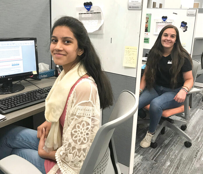 IT’S PAID OFF: Rida Jawed, left, a 2020 Lincoln High School graduate, participated in PrepareRI’s Summer Internship program for two summers. The first year, she served as a paid social media intern for Dr. Day Care in Smithfield with fellow student intern Kenzi Gilmore, right.
COURTESY REBECCA COMPTON IT’S PAID OFF: Rida Jawed, left, a 2020 Lincoln High School graduate, participated in PrepareRI’s Summer Internship program for two summers. The first year, she served as a paid social media intern for Dr. Day Care in Smithfield with fellow student intern Kenzi Gilmore, right.
COURTESY REBECCA COMPTON