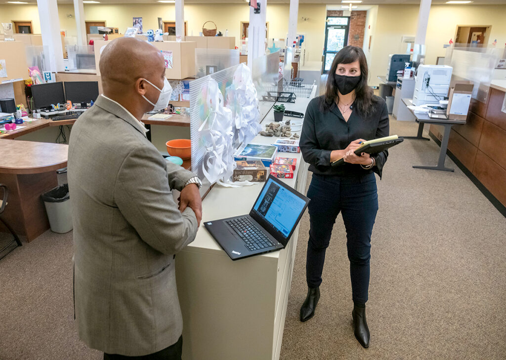 RELIEF CREW: Kyle Bennett and Kristina Brown of the United Way of Rhode Island are helping to oversee the rental-assistance program Safe Harbor Housing, which has used some CARES Act funding. / PBN PHOTO/ MICHAEL SALERNO