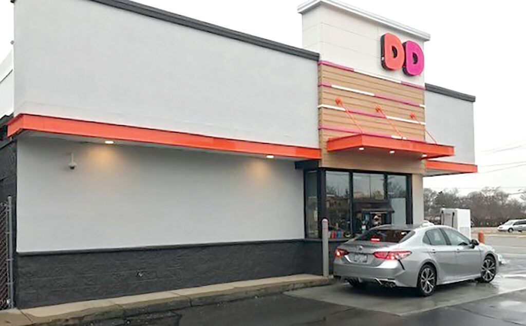 COORDINATED LOOK: The exterior of the new drive-thru window matches the new center column on the front façade of the building.  / COURTESY OF DUNKIN’