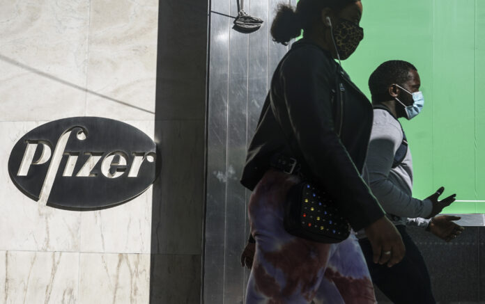 PFIZER SAID that it is asking U.S. regulators to allow emergency use of its COVID-19 vaccine, starting the clock on a process that could bring limited first shots as early as next month and eventually an end to the pandemic - but not until after a long, hard winter. / AP FILE PHOTO/BEBETO MATTHEWS PFIZER SAID that it is asking U.S. regulators to allow emergency use of its COVID-19 vaccine, starting the clock on a process that could bring limited first shots as early as next month and eventually an end to the pandemic - but not until after a long, hard winter. / AP FILE PHOTO/BEBETO MATTHEWS