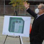 IN A WALK-THROUGH of the project site in October, Leland Peyser, at right, CEO of Peyser Real Estate Group, discussed the Dexter Street Commons project. / COURTESY CITY OF PAWTUCKET