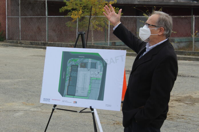 IN A WALK-THROUGH of the project site in October, Leland Peyser, at right, CEO of Peyser Real Estate Group, discussed the Dexter Street Commons project. / COURTESY CITY OF PAWTUCKET