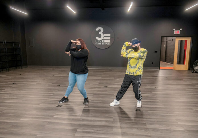 ON THE MOVE: Thr3e Live Dance Complex owners Nikki Gyftopoulos, left, and Tjay Martino recently closed their Johnston studio and expanded to a larger Providence location, where they offer a variety of dance and fitness classes. / PBN PHOTO/MICHAEL SALERNO ON THE MOVE: Thr3e Live Dance Complex owners Nikki Gyftopoulos, left, and Tjay Martino recently closed their Johnston studio and expanded to a larger Providence location, where they offer a variety of dance and fitness classes. / PBN PHOTO/MICHAEL SALERNO
