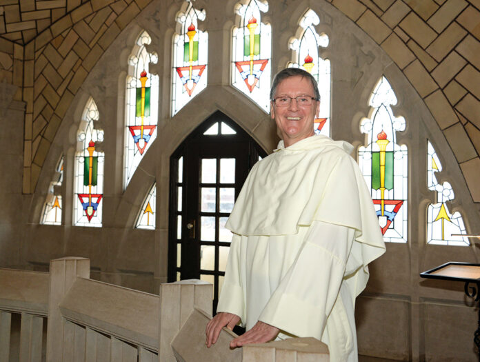 CAMPUS PRESENCE: The Rev. Kenneth R. Sicard, Providence College president, says the fall semester went relatively smoothly, despite an outbreak of COVID-19 among about 100 students in September. / PBN PHOTO/ELIZABETH GRAHAM CAMPUS PRESENCE: The Rev. Kenneth R. Sicard, Providence College president, says the fall semester went relatively smoothly, despite an outbreak of COVID-19 among about 100 students in September. / PBN PHOTO/ELIZABETH GRAHAM