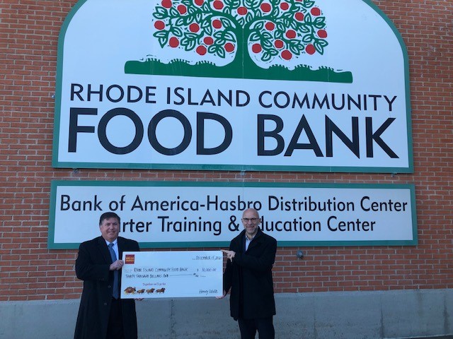 WELLS FARGO & Co. recently donated $30,000 to the Rhode Island Community Food Bank. Pictured are Michael DiSandro, left, Wells Fargo senior vice president of commercial banking, and Rhode Island Community Food Bank CEO Andrew Schiff. / COURTESY WELLS FARGO & CO.