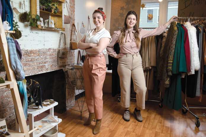 GETTING CREATIVE: Bloom Collective LLC owners Heather Wolfenden, left, and Savannah Barkley hope to support small businesses while filling vacant storefronts with pop-up shops.  / PBN PHOTO/ELIZABETH GRAHAM