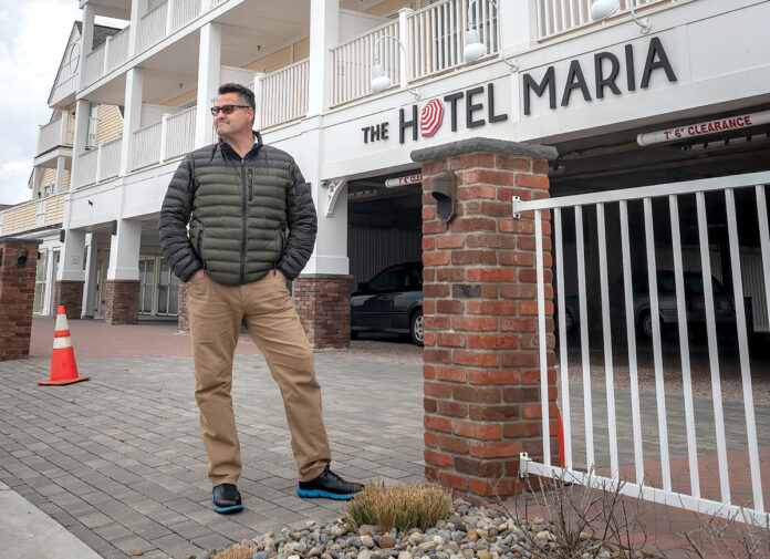 STILL GOING STRONG: John Bellone, owner of The Breezeway Resort, The Hotel Maria, pictured, and Maria’s Seaside Cafe in Westerly, says in his 50 years as a customer of The Washington Trust Co., he’s never deferred a loan payment and has continued to meet monthly payments for the mortgages on his commercial properties throughout the pandemic, thanks to a strong business in a limited season. / PBN PHOTO/MICHAEL SALERNO STILL GOING STRONG: John Bellone, owner of The Breezeway Resort, The Hotel Maria, pictured, and Maria’s Seaside Cafe in Westerly, says in his 50 years as a customer of The Washington Trust Co., he’s never deferred a loan payment and has continued to meet monthly payments for the mortgages on his commercial properties throughout the pandemic, thanks to a strong business in a limited season. / PBN PHOTO/MICHAEL SALERNO