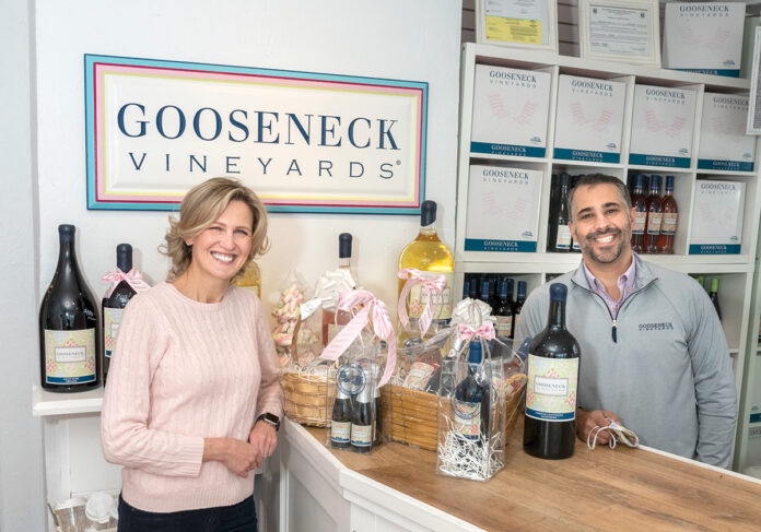 SCOURING THE GLOBE: Cousins Liana Buonanno and Paul Fede, co-owners of Gooseneck Vineyards, work with farmers in six countries to source the grapes for their classic, budget-friendly wines, which they sell in their North Kingstown vineyard shop. PBN PHOTO/MICHAEL SALERNO SCOURING THE GLOBE: Cousins Liana Buonanno and Paul Fede, co-owners of Gooseneck Vineyards, work with farmers in six countries to source the grapes for their classic, budget-friendly wines, which they sell in their North Kingstown vineyard shop. PBN PHOTO/MICHAEL SALERNO