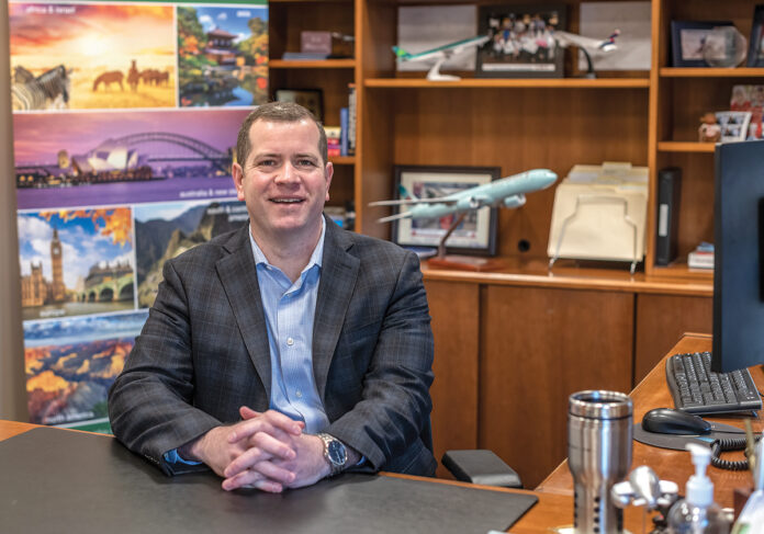 PEACE OF MIND: Jeffrey Roy, executive vice president of revenue management and pricing at Collette Travel Service Inc. in Pawtucket, says the company recently saw a 10% increase in travel insurance purchases. / PBN PHOTO/MICHAEL SALERNO PEACE OF MIND: Jeffrey Roy, executive vice president of revenue management and pricing at Collette Travel Service Inc. in Pawtucket, says the company recently saw a 10% increase in travel insurance purchases. / PBN PHOTO/MICHAEL SALERNO