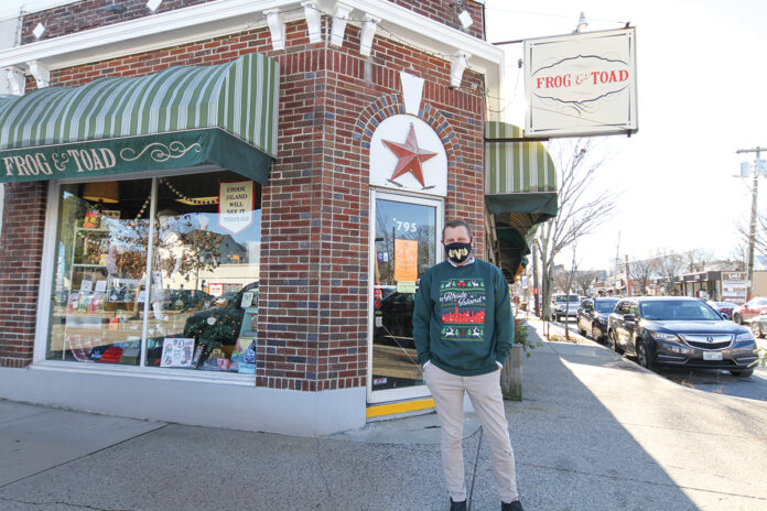 SIGN OF THE TIMES: Asher Schofield, co-owner of Frog & Toad LCC in Providence, has kept the retailer’s two locations closed to foot traffic during the pandemic, but Frog & Toad has been able to offset that loss of business with online sales and curbside pickup.  / PBN PHOTO/PAMELA BHATIA