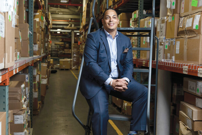 CLIMBING THE LADDER: Junior Jabbie started as an intern at Banneker Supply Chain Solution Inc. in North Smithfield in 2005. Now he is the company’s top executive. / PBN PHOTO/RUPERT WHITELEY