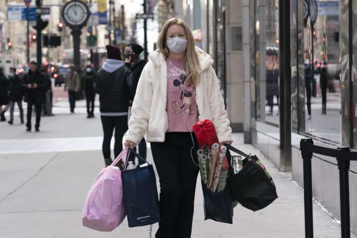 U.S. CONSUMER SPENDING increased by 2.4% in January. /AP FILE PHOTO/MARK LENNIHAN
