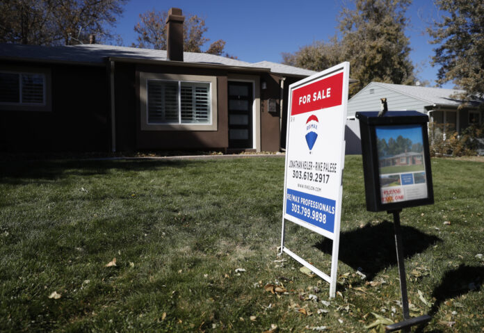 THE MEDIAN SALE price of a single-family home in Rhode Island was $334,000 in January. / AP FILE PHOTO/DAVID ZALUBOWSKI